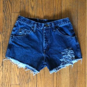 Vintage distressed Wrangler denim shorts